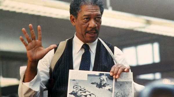 Morgan Freeman holding up a crime scene photo in Se7en