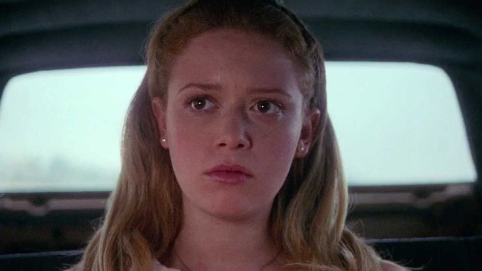 Natasha Lyonne sitting in the back of a car in But I'm a Cheerleader