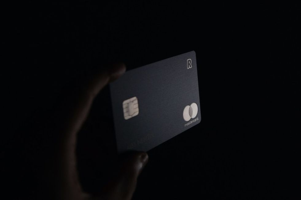 person holding a credit card