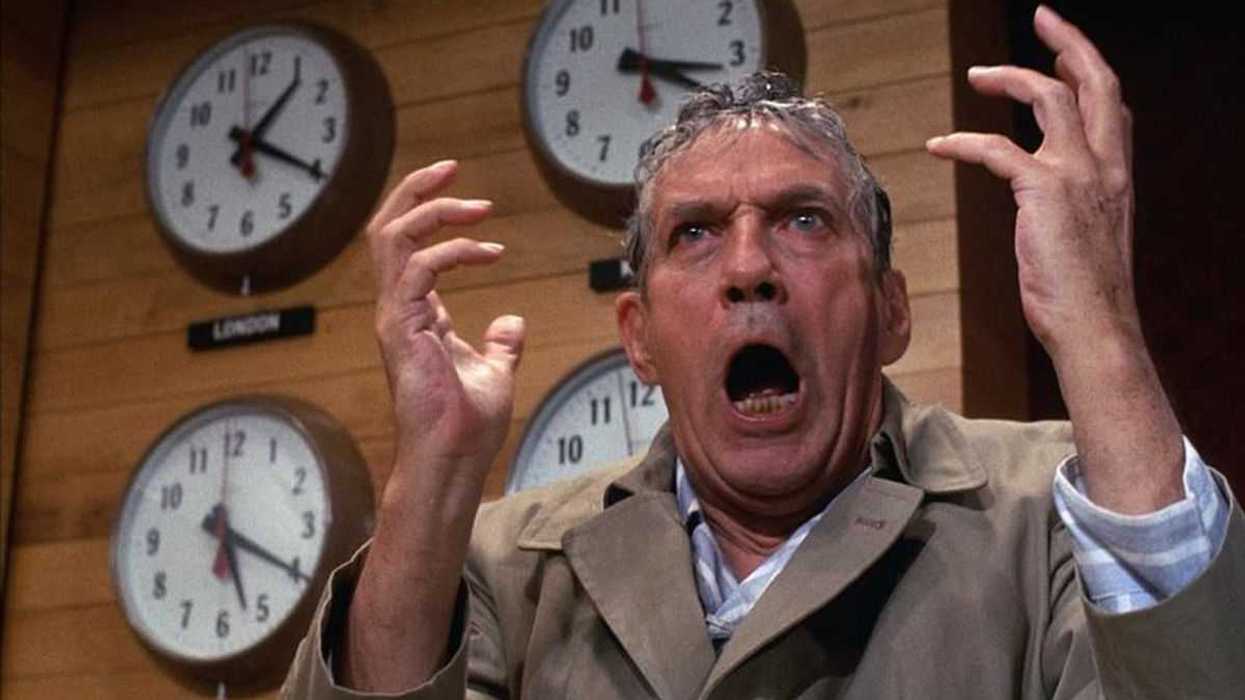 Peter Finch as Howard Beale ranting on live television