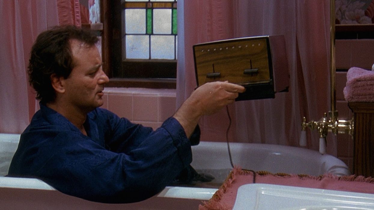 Phil Connors, played by Bill Murray, dropping a toaster into a bathtub in 'Groundhog Day'