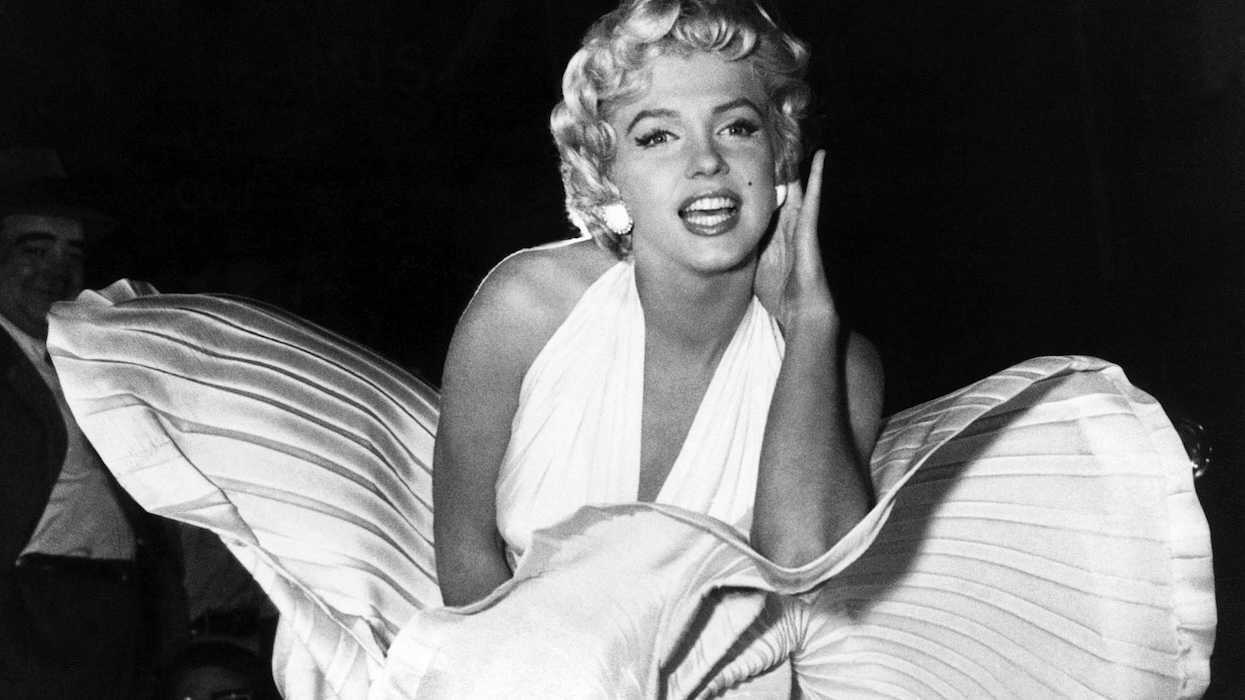 Photo of Marilyn Monroe while filming The Seven Year Itch on the streets of New York.