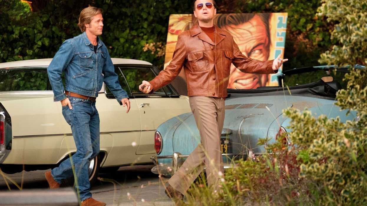 Rick Dalton, played by Leonardo DiCaprio, walking and talking to Cliff Booth, played by Brad Pitt, in 'Once Upon a Time in Hollywood'