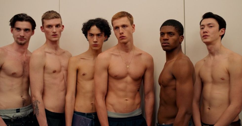 Six shirtless male models
