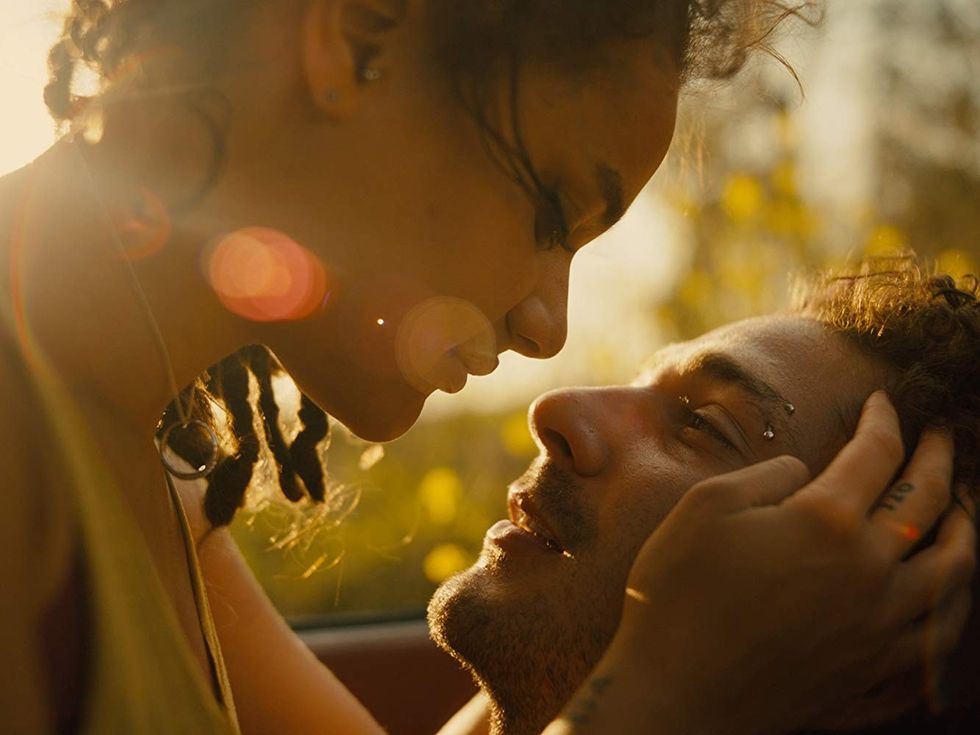 Star, played by Sasha Lane, kissing Jake, played by Shia LaBeouf, in 'American Honey'