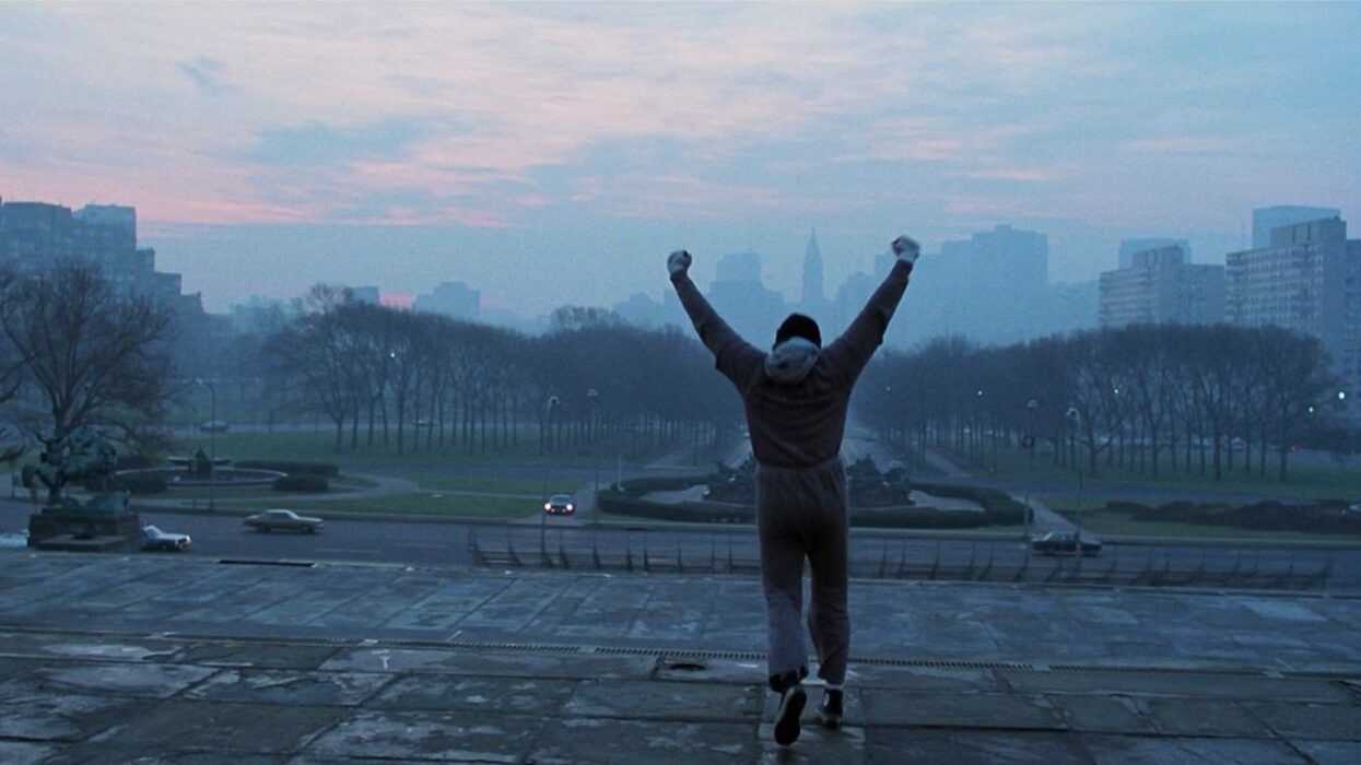 Sylvester Stallone as Rocky, finishing his run at the Philadelphia Museum of Art
