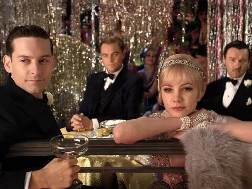The cast of 'The Great Gatsby' overlooking a party