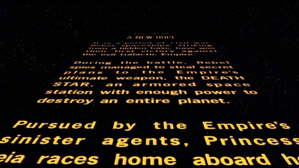 The opening crawl receding into space in Star Wars 1977