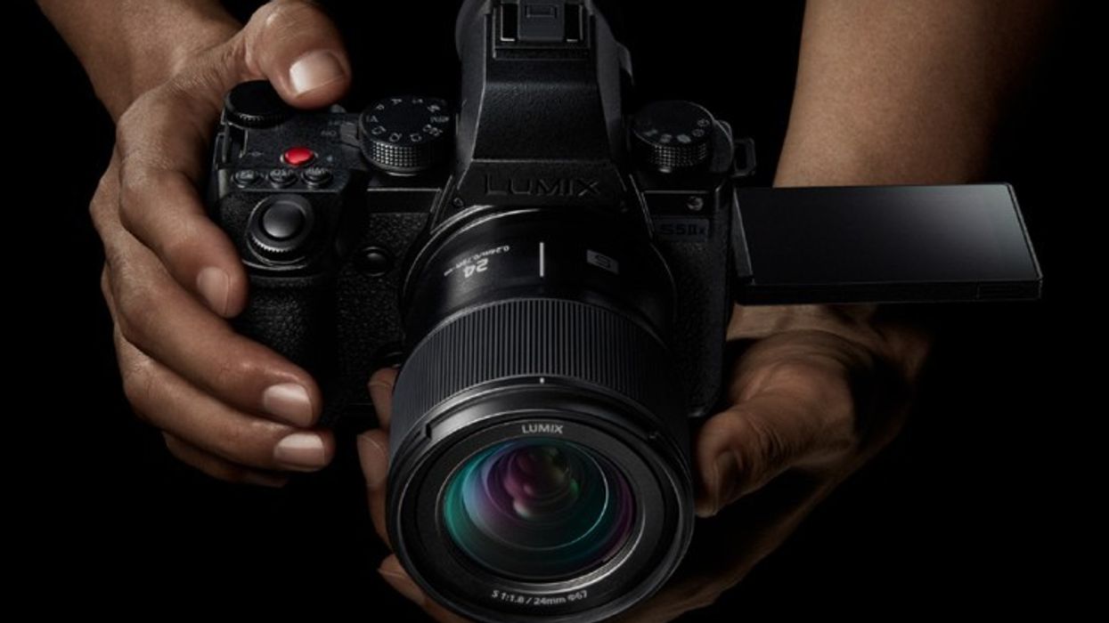 The Panasonic S5 II being held by two hands.
