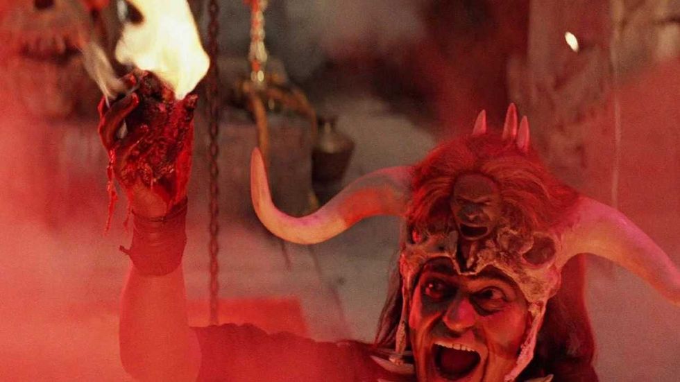 The Thuggee leader holding a flaming heart in Indiana Jones and the Temple of Doom