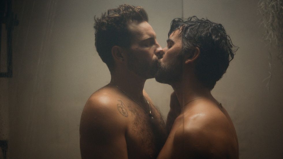 Thomas, played by Nico Tortorella, and Oscar, played by Juan Pablo Di Pace, kissing in the shower, 'The Mattachine Family'
