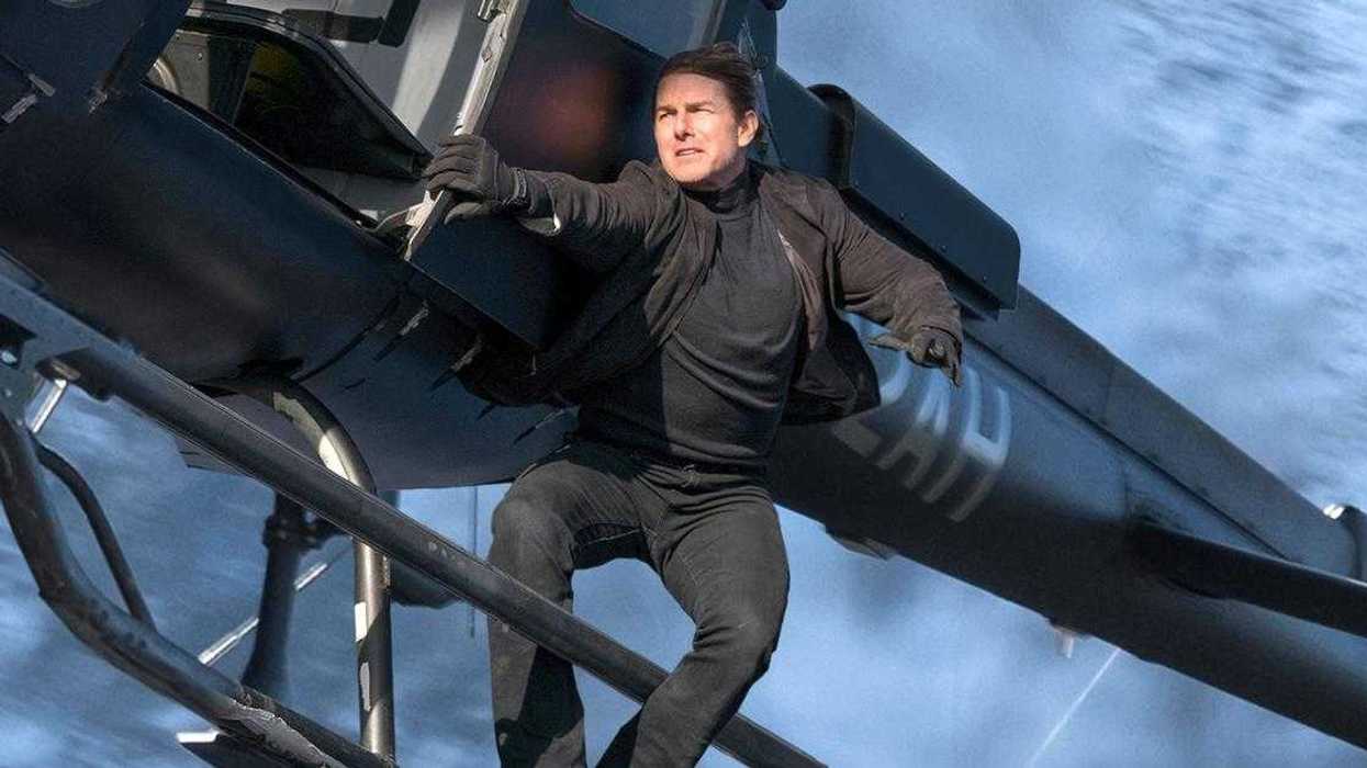 Tom Cruise performing a daring helicopter stunt as IMF agent Ethan Hunt in the 2018 action blockbuster Mission: Impossible – Fallout