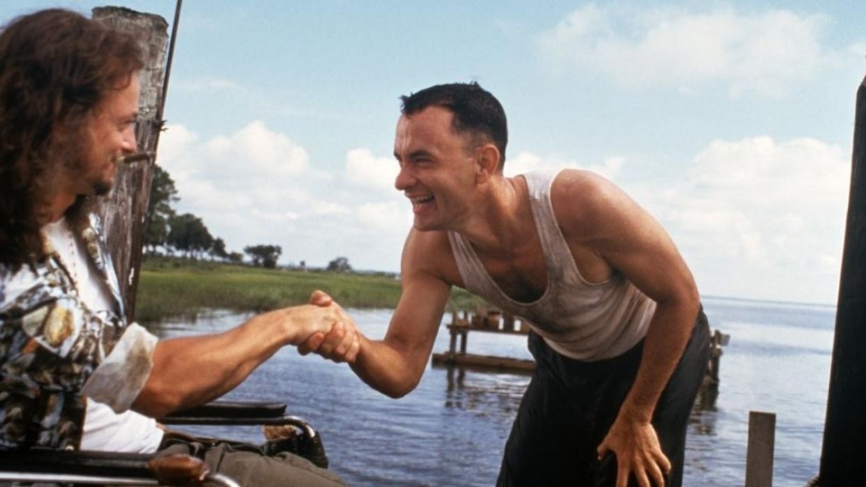 Tom Hanks as Forrest Gump shaking hands with Gary Sinise as Lieutenant Dan Taylor in 'Forrest Gump'