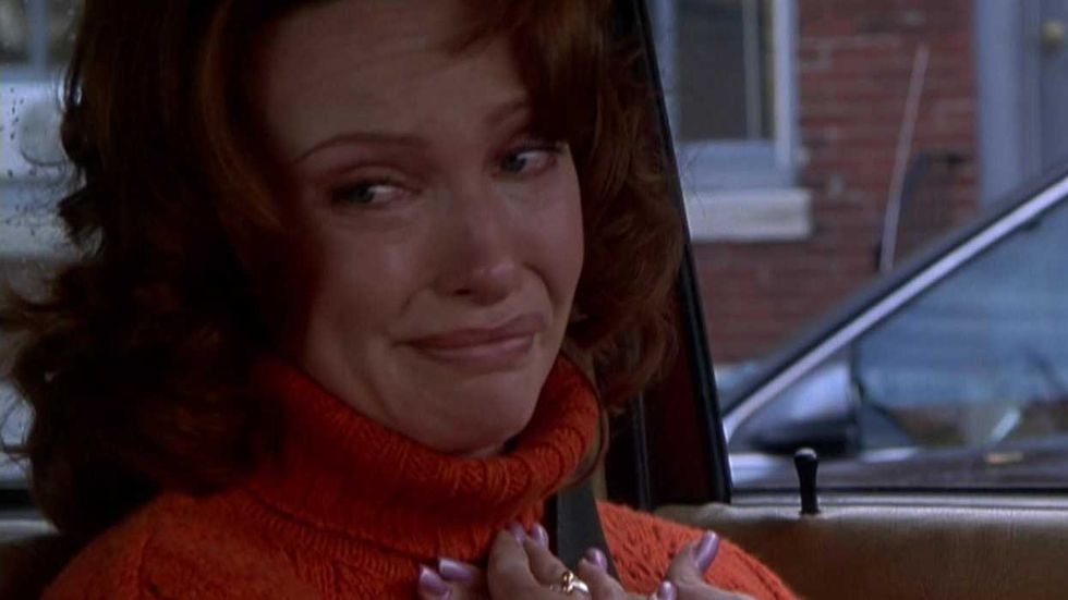 Toni Collette as Lynn Sear crying in the car in The Sixth Sense