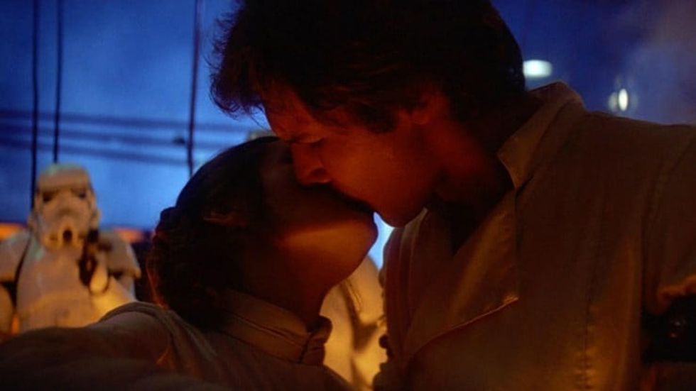 Two people kissing on a space ship, 'Star Wars: The Empire Strikes Back'