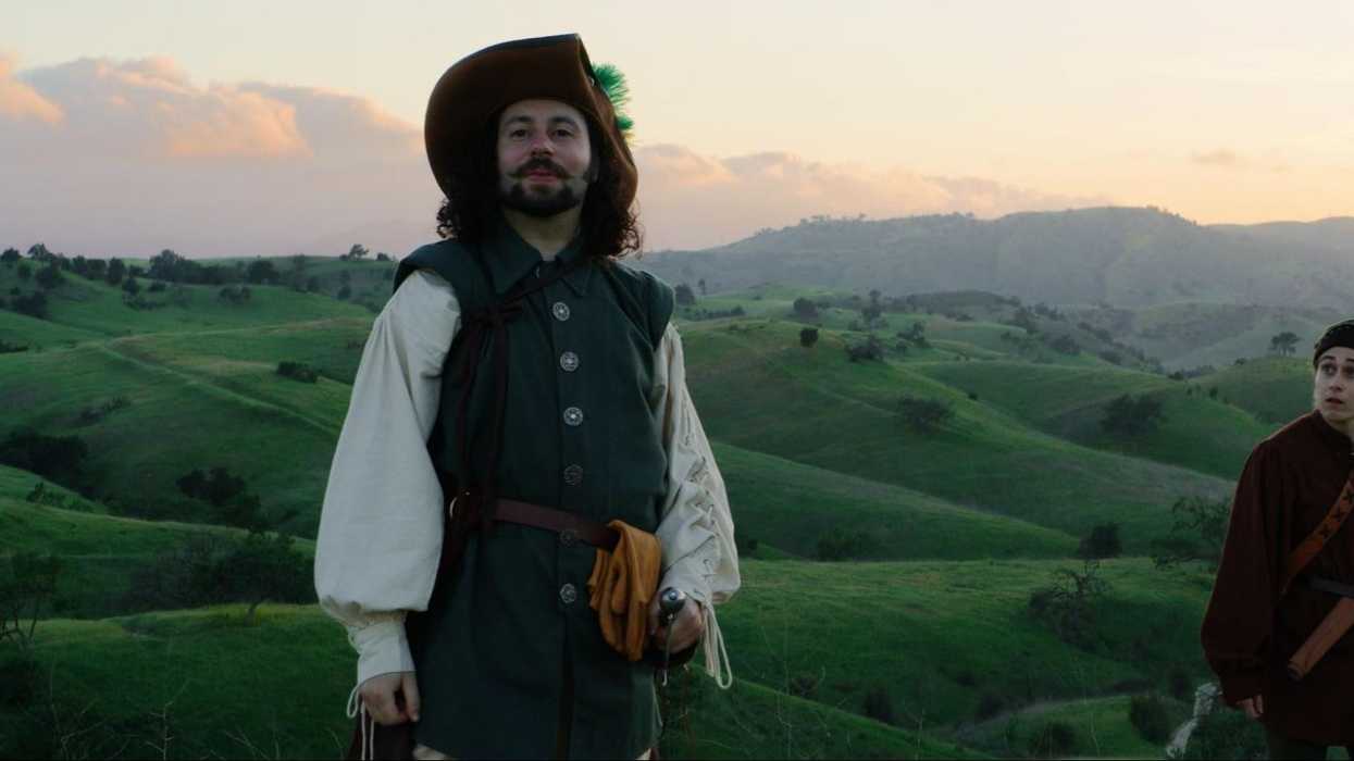 Two pirates standing on a hill at sunset in 'The Flower of Battle'