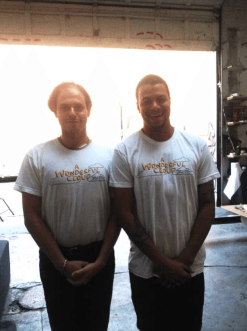 \ufffcEugene and the film\u2019s Executive Producer, Christian Rosa, posing like Oscar statues in their Cloud shirts.