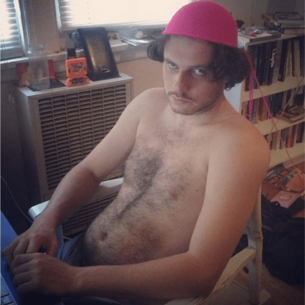 \ufffcKotlyarenko writing on little sleep, looking like the sad clown that he is