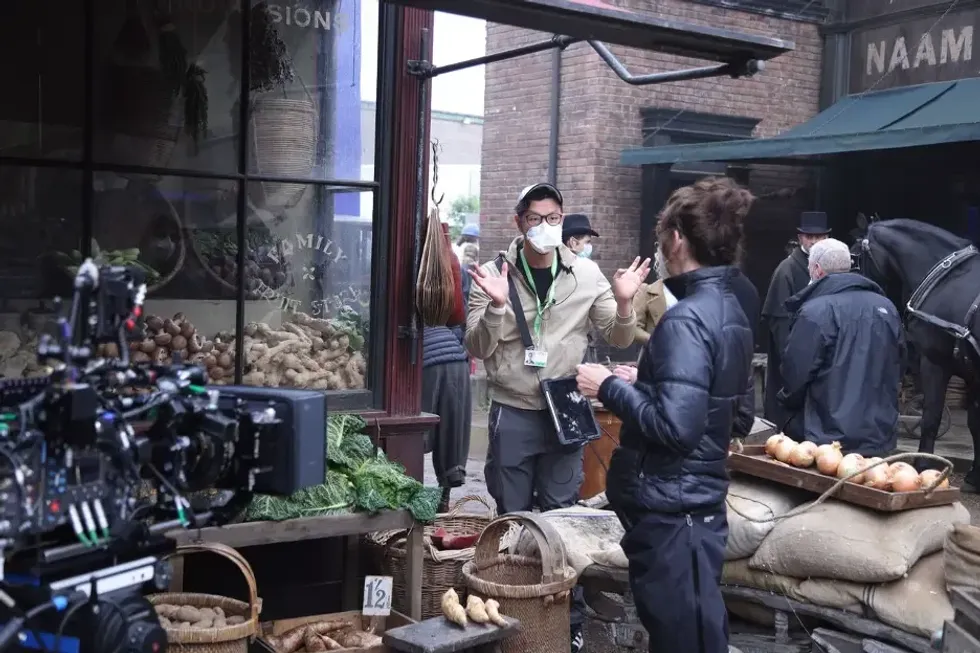 VFX Supervisor Johnny Han discussing a VFX shot with DP Anette Haellmigk