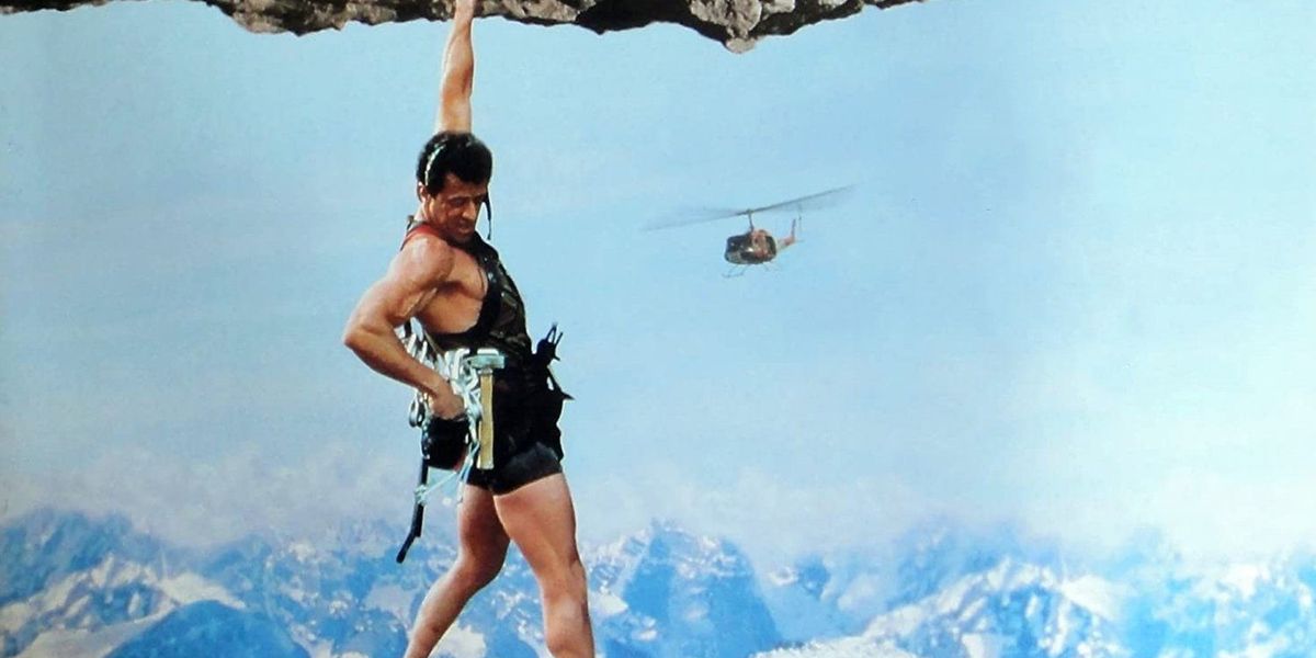 What Is a Cliffhanger? Definition and Examples 'a man holding onto a cliff'