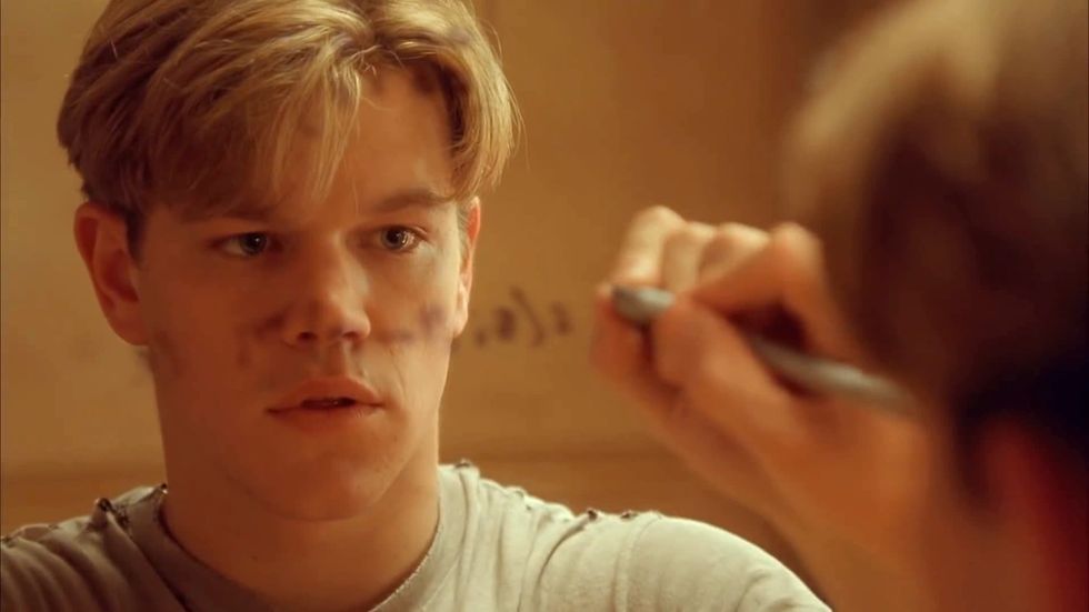 Will Hunting, played by Matt Damon, writing on a mirror in 'Good Will Hunting'