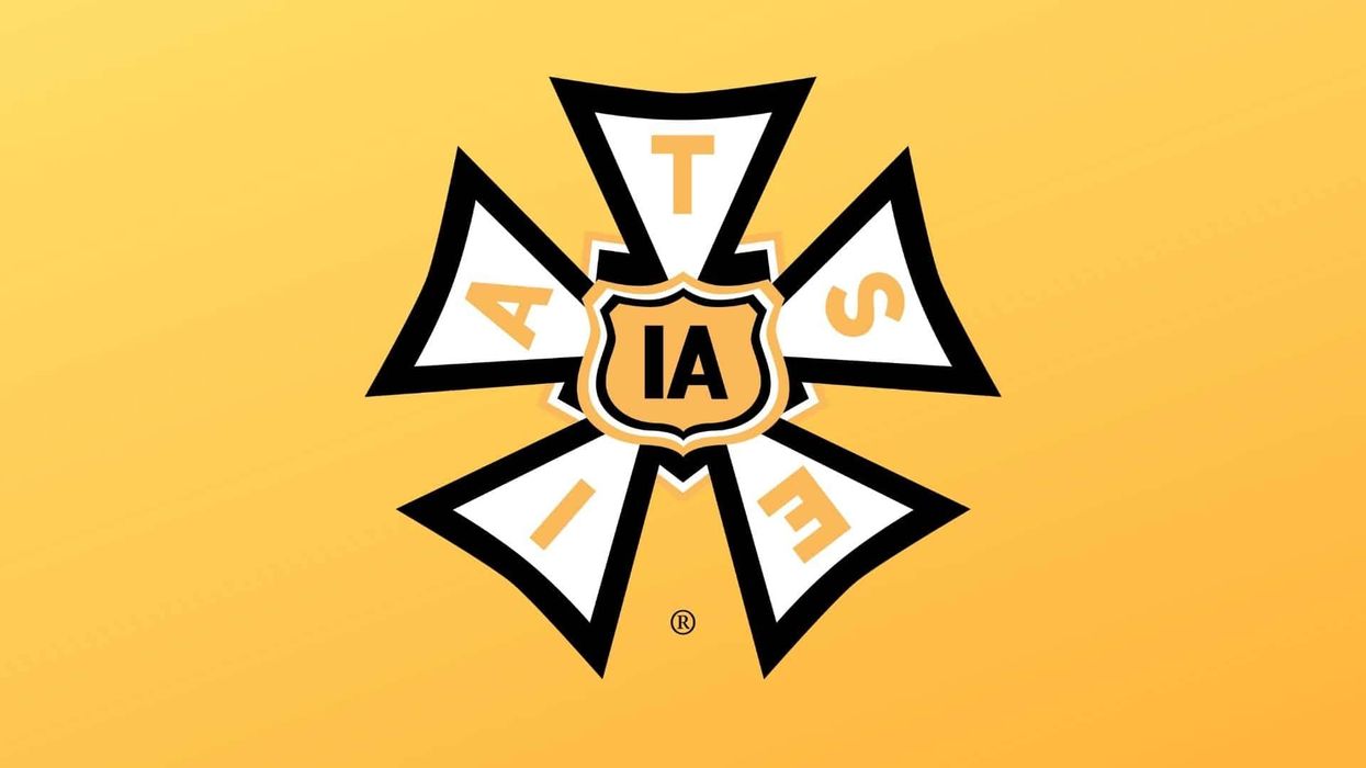 Yellow, white, and black IATSE logo on a yellow background. 