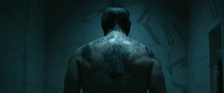 John Wick's back tattoo while he showers in 'John Wick'