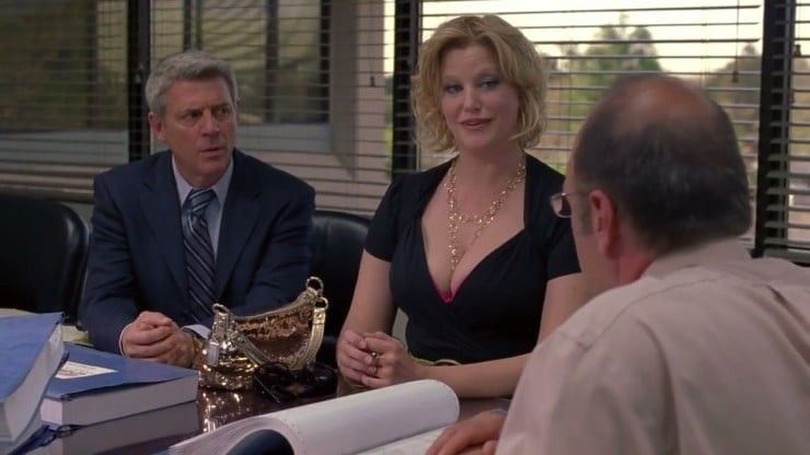 A woman and two men in a meeting, 'Breaking Bad'