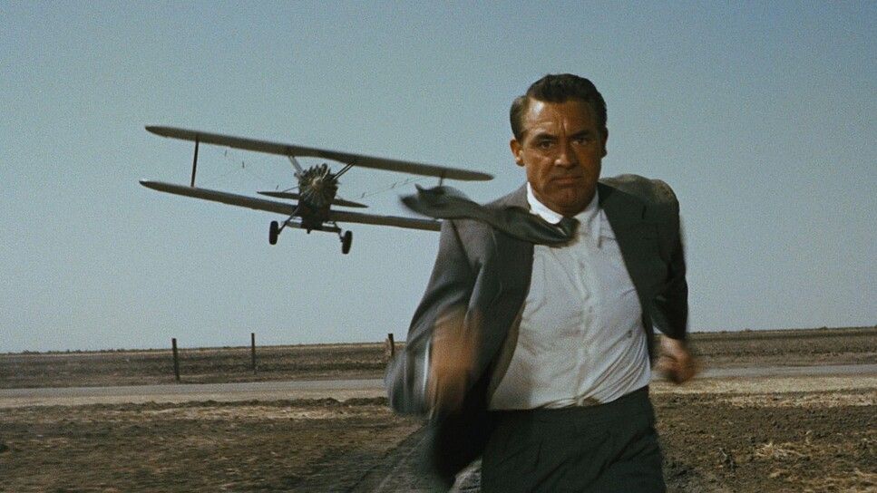 Cary Grant as Roger Thornhill being chased by a plane in 'North by Northwest'