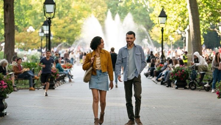 Briana Middleton and Justice Smith walking in the park in 'Sharper'
